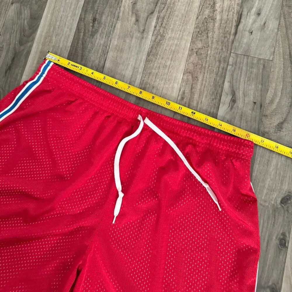 Vintage retro Nike red mesh shorts with blue piping